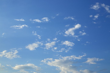 fluffy white cloud moving above clear blue sky in the morning day