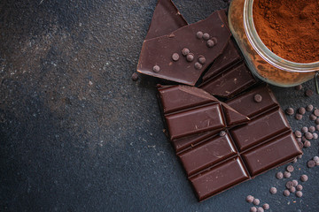 chocolate (delicious cocoa dessert, pieces ofbackground. top view. copy space sweets) menu concept....