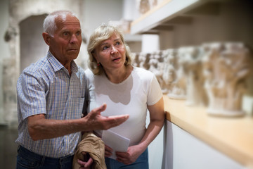 Man and woman visiting museum