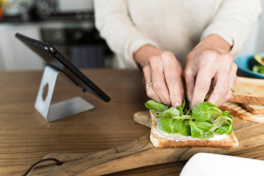 tablet and an healthy sandwich