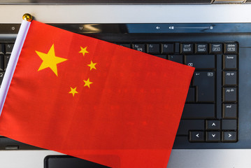 flag of China on computer, laptop keyboard