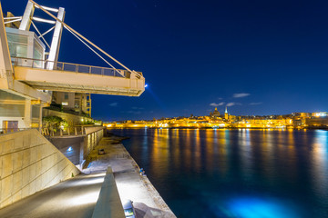 Harbor in Sliema and at the Valletta city at night, Malta
