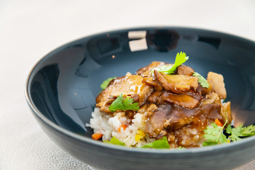 Vietnamese style caramel pork with rice and vegetable