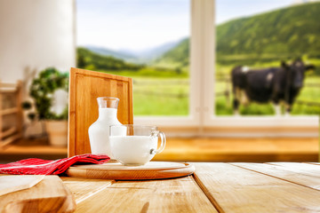 Table background of free space for your decoration and blurred interior of kitchen 