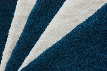 White and blue bath towels close up view 