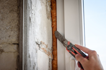 Remove excess polyurethane foam with a knife.