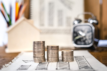 Money growing concept-Money and income graph drawing On Home office desk