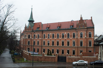 Fototapeta premium The most famous Polish Royal Cracow Wawel Castle on Christmas Day in rainy weather.