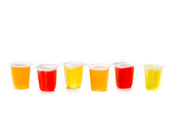 jellies of different flavors and colors isolated on white background