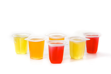 jellies of different flavors and colors isolated on white background. Copy space