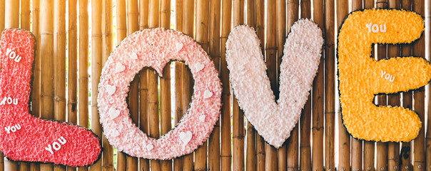 Artificial candles decorated as text to decorate as a backdrop for photography. to represent the...
