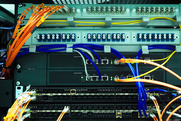 working server. Internet wires and flashing lights on the server.