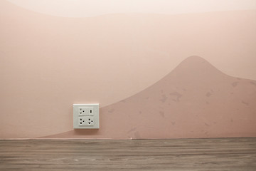 Plug Socket on the Wall with Pastel Background/Flower