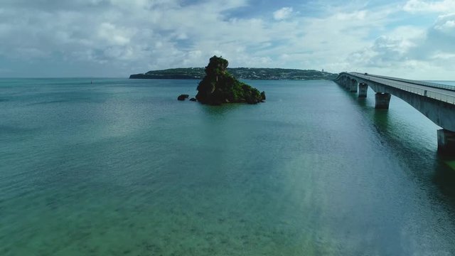「ドローン空撮」沖縄今帰仁村の人気観光地、古宇利島にかかる古宇利大橋-"Drone aerial photography" Kouri Ohashi Bridge over Kouri Island, a popular tourist destination of Okinawa Nakijin Village