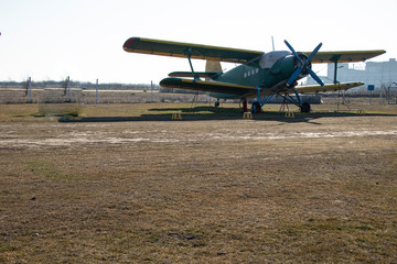 Old airplanes. Green and blue corncob. Sports plane of the 19th century. Until now they fly. Touch...