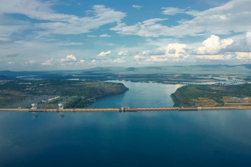 Naklejka na ściany i meble Fraternal hydroelectric power station, view of dam and river, in