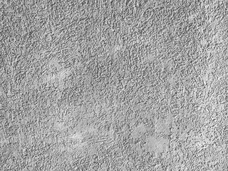 The texture of the plaster is bark beetle on the wall. Seamless texture.