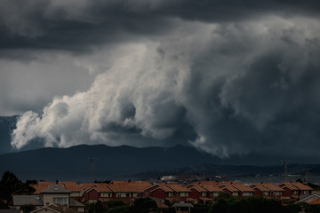Heavy storm clouds above a town