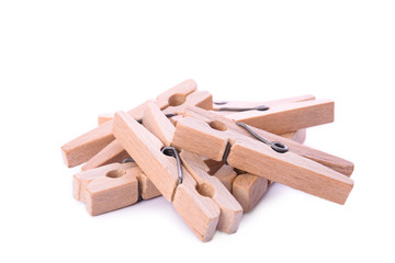 Wooden pegs isolated on white background. Zero waste alternative for plastic pins. Eco friendly concept