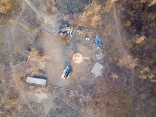 Aerial drone view. Construction site among the forest.