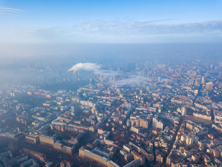 Aerial drone view. Houses in the city center of Kiev on a foggy morning.