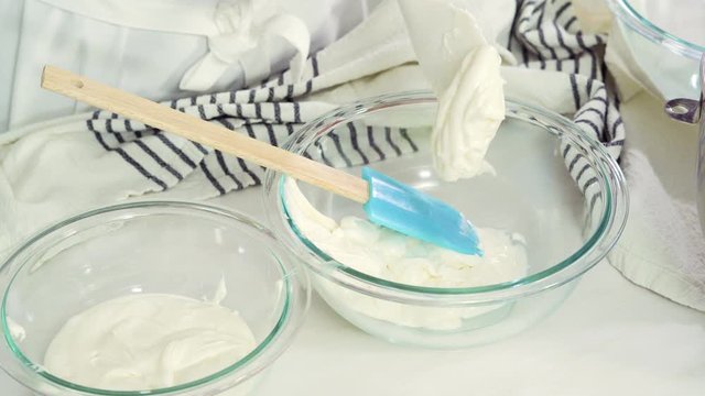 Step by step. Flat lay. Mixing royal icing to decorate Easter sugar cookies.