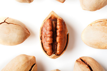 Purified Pecan isolated in the center on white background.
