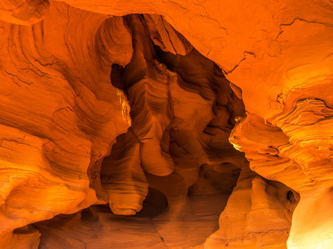 General view of the reddish caves of Can Riera very similar to the Antelope canyon.