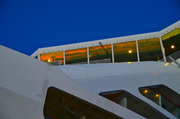 Navigational bridge, bow and superstructure detail view close up of modern cruiseship or cruise...