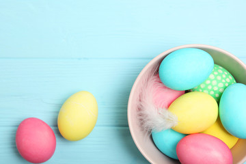 Easter eggs on the table top view. Easter composition with a place to insert text.