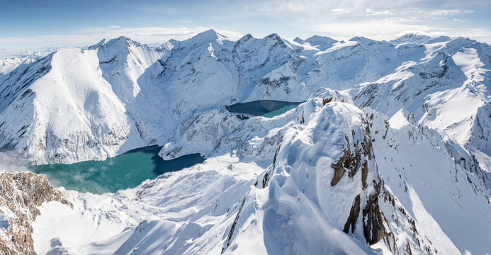 Snowcapped mountain landscape with mountain lakes