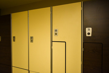 yellow and brown gym lockers 