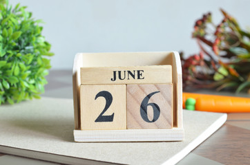 June 26, Appointment date with number cube design for background.	