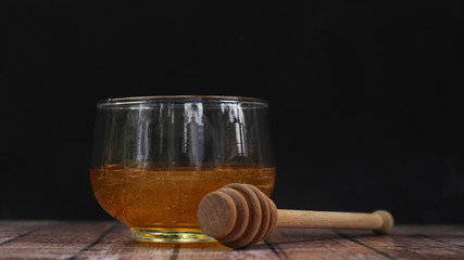 Honey is nutritious for health, stirring with a honey spoon 
