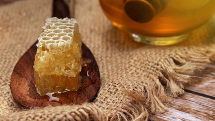 Honey is nutritious for health, stirring with a honey spoon 