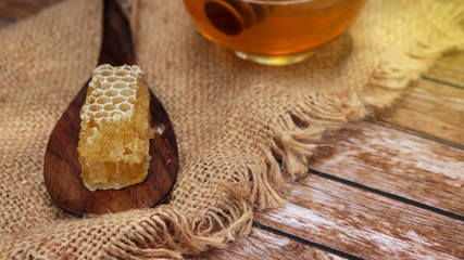 Honey is nutritious for health, stirring with a honey spoon 