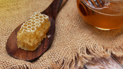 Honey is nutritious for health, stirring with a honey spoon 
