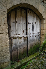 old wooden door in a house of Ujué, in Navarra