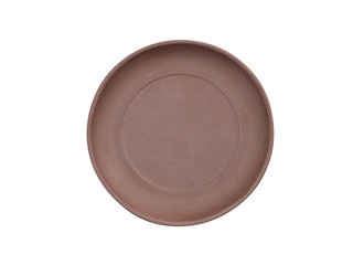 Brown clay plate on white isolated background. Healthy eating concept