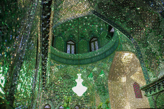 Shiraz, Iran - May 16, 2017: is a funerary monument and mosque in Shiraz, Iran, housing the tomb of the brothers Ahmad and Muhammad. Unusual mosque with many mirrors reflecting green