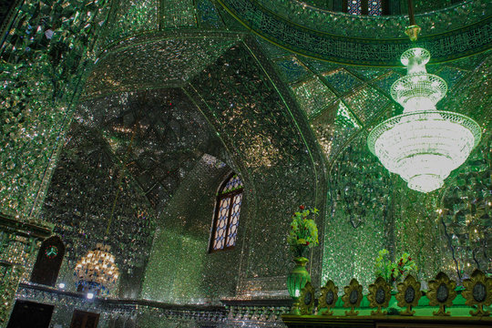 Shiraz, Iran - May 16, 2017: is a funerary monument and mosque in Shiraz, Iran, housing the tomb of the brothers Ahmad and Muhammad. Unusual mosque with many mirrors reflecting green