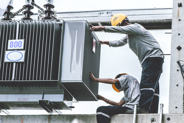 technician or electricity engineer working setup replace new electricity current transformer size...