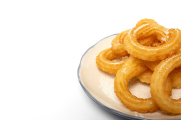 Cup of chocolate sauce with churros