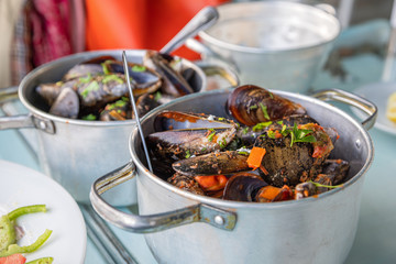 Mussels in spicy sauce, served in a pan, Athens, Greece