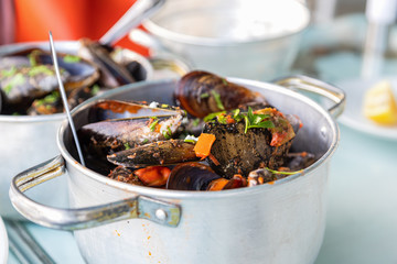 Mussels in spicy sauce, served in a pan, Athens, Greece