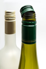 Screw bottle caps in green and white colors