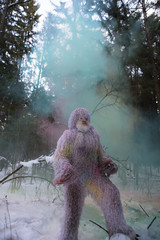 Yeti fairy tale character in winter forest.