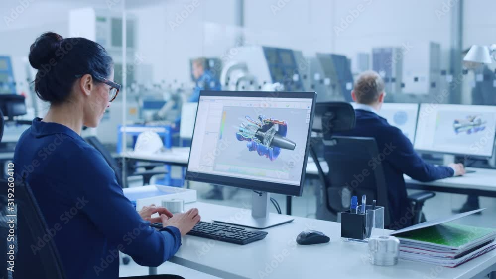 Poster Industrial female Engineer Working on a Personal Computer, Screen Shows CAD Software with 3D Prototype of Engine. Busy Factory with Professional Workers High-Tech Machinery