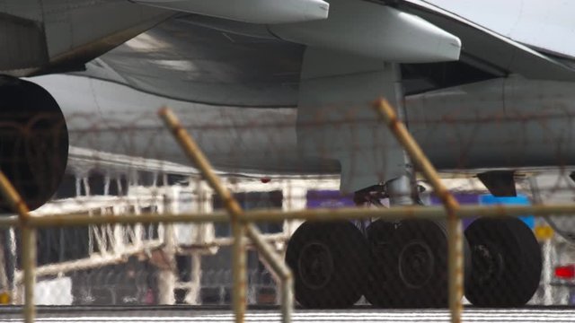 Engine and gear of widebody airplane close up
