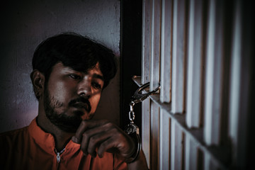 Prisoner in the iron prison,prisoner concept,thailand people,Hope to be free.